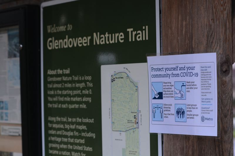 PMG PHOTO: DAVID BALL - A list of COVID-19 social distancing requirements has been posted at the main trail head of Glendoveers two-mile fitness trail. 
