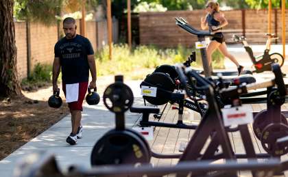Members work out at an outdoor section of Sonoma Fitness in Petaluma.