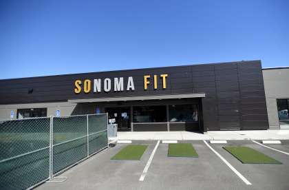 A partially blocked off parking lot is designated for outdoor workouts at Sonoma Fitness in Petaluma.