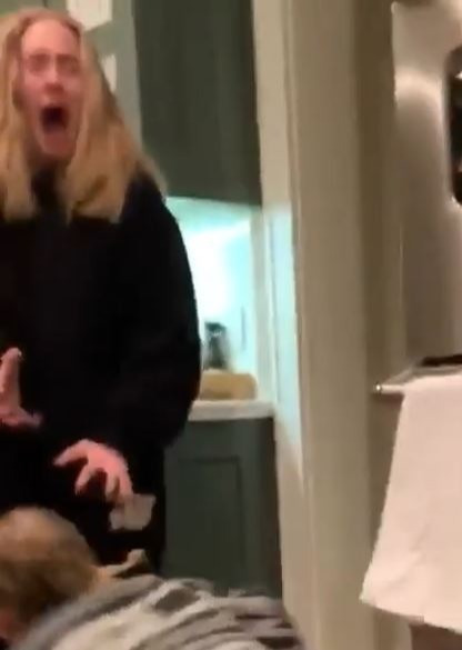 The singer is filmed screaming after Nicole jumps out at her